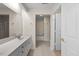 Bathroom featuring double sinks and a shower-tub combination at 11340 Involute Pl # 100, Raleigh, NC 27617