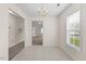 Cozy dining area featuring tile flooring and a window with natural light at 11340 Involute Pl # 100, Raleigh, NC 27617
