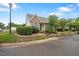 Charming home featuring a brick facade, well-maintained landscaping, and a welcoming front entrance at 11340 Involute Pl # 100, Raleigh, NC 27617