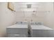 Laundry room with washer, dryer, and wire shelving at 11340 Involute Pl # 100, Raleigh, NC 27617