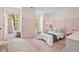 Charming bedroom boasts unique pink trim, soft natural light, and ample space at 115 Nuttree Way, Durham, NC 27713