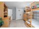 Light and airy bedroom with built-in shelving, carpet, and charming bunk beds at 115 Nuttree Way, Durham, NC 27713