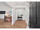 Bright foyer featuring hardwood floors, shiplap wall accent and staircase at 115 Nuttree Way, Durham, NC 27713