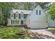 Beautiful home exterior with dormer windows and a two-car garage at 115 Nuttree Way, Durham, NC 27713