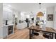 Spacious open kitchen with stainless steel appliances, ample storage, and a cozy breakfast nook at 115 Nuttree Way, Durham, NC 27713