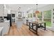 The kitchen features a stainless steel appliance and a breakfast nook with backyard views at 115 Nuttree Way, Durham, NC 27713