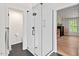 Modern shower with glass enclosure, white subway tile, and dark fixtures at 115 Nuttree Way, Durham, NC 27713