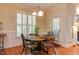 Charming dining room with natural light and views of the landscaped backyard at 119 Marykirk Pl, Garner, NC 27529