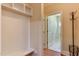 Neat entryway with built-in shelves and adjacent doorway at 119 Marykirk Pl, Garner, NC 27529