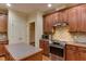 Gourmet kitchen with stainless steel appliances, custom cabinets, and center island at 119 Marykirk Pl, Garner, NC 27529