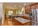 Well-equipped kitchen with stainless steel appliances, breakfast nook, and ample counter space at 119 Marykirk Pl, Garner, NC 27529