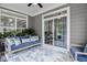 Screened porch with comfortable seating, offering a relaxing space to enjoy the outdoors at 120 Bramble Ln, Clayton, NC 27527