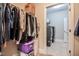 View from closet to laundry room featuring front load washer and dryer, and lots of storage at 120 Bramble Ln, Clayton, NC 27527