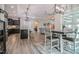 Spacious open floorplan connecting the kitchen, dining area, and living room, perfect for modern living at 120 Bramble Ln, Clayton, NC 27527