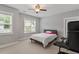 Bedroom with two windows and gray walls at 122 Swansboro Ln, Chapel Hill, NC 27516