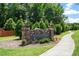 Claremont South community entrance sign with stone pillars at 122 Swansboro Ln, Chapel Hill, NC 27516