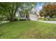 Charming two-story home with manicured lawn and a two car garage at 12501 Garden Tree Ln, Raleigh, NC 27614