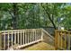 Deck overlooking wooded backyard with storage shed at 1392 L Cooper Rd, Cameron, NC 28326