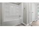 Bathroom with full tub/shower combo with tiled walls at 1392 L Cooper Rd, Cameron, NC 28326