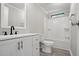 Bathroom includes modern sink and vanity with a bathtub and shower at 1392 L Cooper Rd, Cameron, NC 28326