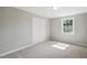 Bedroom featuring a closet and a window at 1392 L Cooper Rd, Cameron, NC 28326