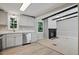 The kitchen features gray cabinets and countertops, as well as stainless appliances at 1392 L Cooper Rd, Cameron, NC 28326
