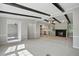 Spacious living room featuring an open floor plan with access to the kitchen and dining area at 1392 L Cooper Rd, Cameron, NC 28326