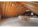 Spacious attic with wood beams, wood subflooring, and potential for versatile use at 1404 Kings Lassiter Way, Raleigh, NC 27614