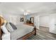 Spacious bedroom with a neutral color palette, ceiling fan, and private ensuite bath at 1404 Kings Lassiter Way, Raleigh, NC 27614