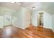 Attic with hardwood floors and a light, mint green colored paint at 1408 Old Ivey Rd, Apex, NC 27523
