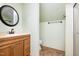 Bathroom featuring vanity with countertop, toilet, and a shower with glass doors at 1408 Old Ivey Rd, Apex, NC 27523