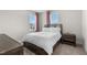 Serene bedroom showcasing neutral tones, natural light, and a comfortable bed at 1423 Tannin Dr, Durham, NC 27713