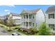 Charming two-story home with a double front porch situated in a quiet neighborhood at 1423 Tannin Dr, Durham, NC 27713