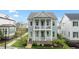 Charming two-story home with a welcoming front porch and manicured landscaping at 1423 Tannin Dr, Durham, NC 27713