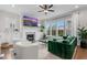 Bright living room with fireplace, large windows, and stylish furnishings for comfortable living at 1423 Tannin Dr, Durham, NC 27713