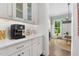 Walk-in pantry with white cabinets and serving station at 1423 Tannin Dr, Durham, NC 27713
