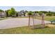 Neighborhood basketball court offers outdoor activities, surrounded by homes and green lawns at 1458 Wragby Ln, Apex, NC 27502