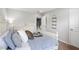 Bedroom with white furniture, carpeted floor, view of the staircase and a decorative wall ladder at 1458 Wragby Ln, Apex, NC 27502