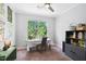 Bright bedroom features a large window with scenic views at 1458 Wragby Ln, Apex, NC 27502