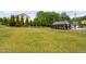 Large grassy community park features a covered picnic area, a soccer goal, and lush landscaping at 1458 Wragby Ln, Apex, NC 27502