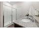 Bathroom featuring granite counter top vanity and shower with glass door at 1512 Arapahoe Ridge Dr, Raleigh, NC 27604