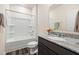 Bathroom featuring vanity with granite countertop and bathtub with shower at 1512 Arapahoe Ridge Dr, Raleigh, NC 27604