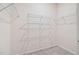 Walk in closet with wire shelving and plush carpet flooring at 1512 Arapahoe Ridge Dr, Raleigh, NC 27604