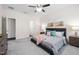 Spacious main bedroom with neutral tones, and two entry doors for easy access at 1512 Arapahoe Ridge Dr, Raleigh, NC 27604