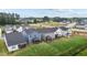 Neighborhood aerial view, featuring lush lawns, cozy screened-in porches, and peaceful residential streets at 159 Wood Orchid Ln, Garner, NC 27529