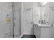 Clean bathroom with glass shower, vanity, and modern fixtures at 159 Wood Orchid Ln, Garner, NC 27529