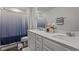 Modern bathroom with double vanity sinks and stylish fixtures at 159 Wood Orchid Ln, Garner, NC 27529