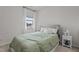 Serene bedroom with plush carpeting, a window, and neutral decor at 159 Wood Orchid Ln, Garner, NC 27529