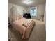 Cozy bedroom with a fun canopy bed, soft carpet, and ample space at 159 Wood Orchid Ln, Garner, NC 27529