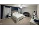 Spacious main bedroom with a neutral color scheme, plush carpet, and natural light at 159 Wood Orchid Ln, Garner, NC 27529